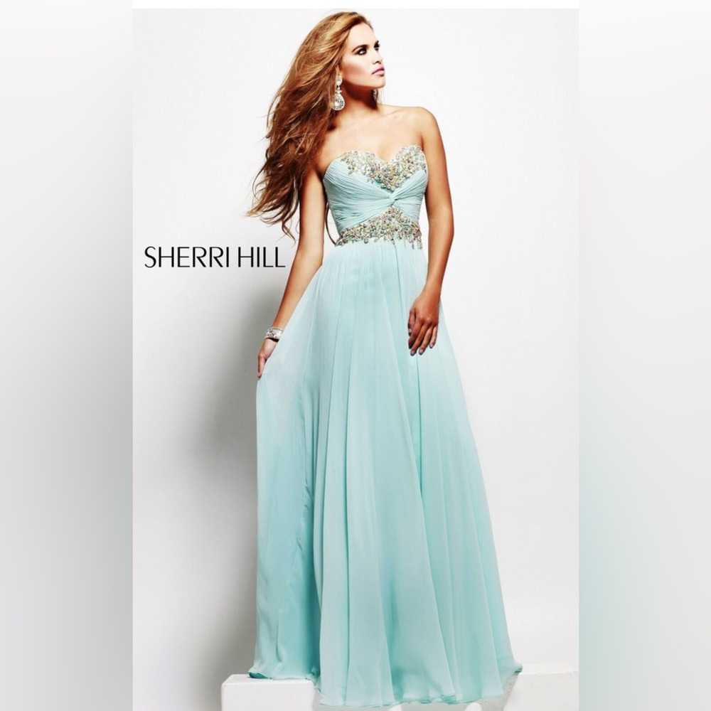 089 Sherri Hill Strapless Light Blue Gown with Gold Embellishments